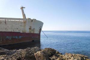 Abandoned ship that was shipwrecked off near the coast of Cyprus photo