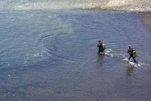 Two divers go to sea on the island of Tenerife. photo