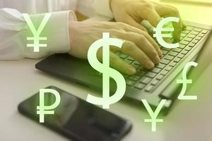 Foreign currency exchange concept, forex trading. Dollar, euro, pound and yen. photo