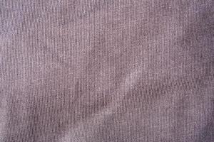 Texture of brown, cotton fabric, crumpled fabric. photo