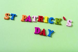 Wooden multicolored letters of St. Patrick's Day. photo