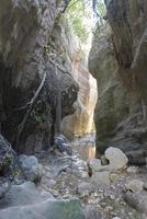 Sunlit multicolored rocks of Avakas Gorge in Cyprus. photo