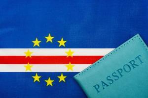 On the background of the flag of Cape Verde is a passport. photo