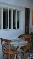 Classic wooden chairs and tables for a vintage interior of a coffee shop. photo