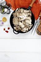 Vegetarian meals. Oyster mushrooms in pan for cooking. Studio Photo