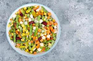 Mix of different frozen vegetables, healthy eating, vitamin preservation. Studio Photo