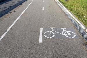 bike lane, road for bicycles Walking bike path in the summer, city Park. photo