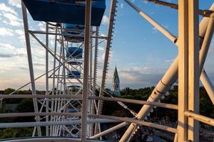 View of Inside of Ferris Wheel view of the structure with cabins. photo