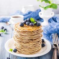 Delicious pancakes with fresh blueberries photo