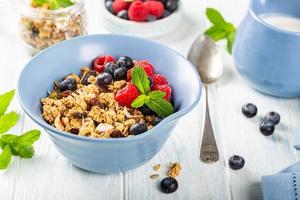 Oat granola with berries and yoghurt photo