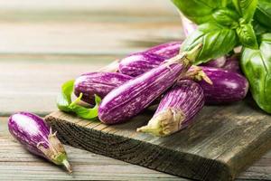 Heap of small eggplant or aubergine photo