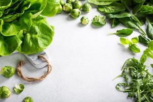Background with assorted green vegetables photo