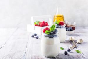 Healthy breakfast with natural yoghurt and berries photo