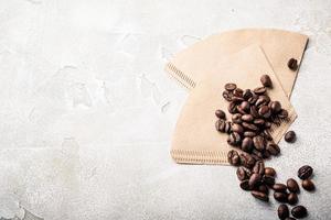 Filters and coffee beans photo