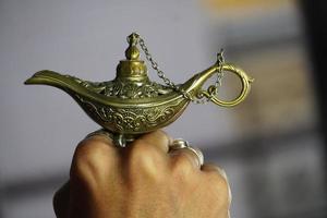 Charming genie aladdin's lamp photo