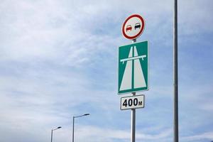 Traffic sign view against the blue sky. photo