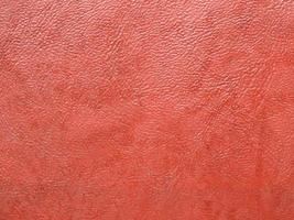 red leatherette faux leather texture background photo