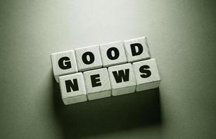 Good News Word with Wooden Cubes photo