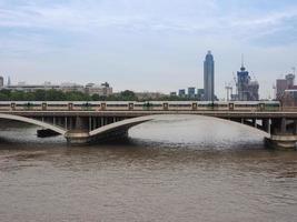 Grosvenor Bridge over river Thames in London photo