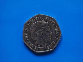 Twenty Pence coin, United Kingdom in London over blue photo