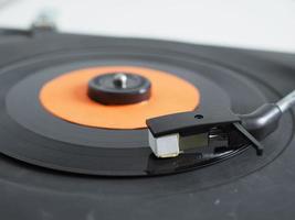 Vinyl record on turntable photo