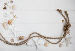 Seashells and sea decorations with rope photo