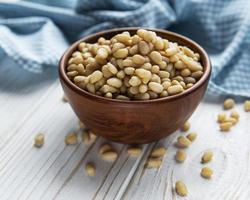 Pine nuts on a table photo