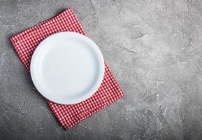 Empty white plate with nupkin photo