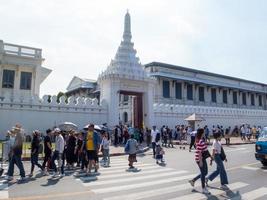 Wat Phra Kaew Temple of the Emerald Buddha BANGKOK THAILAND31 DECEMBER 2018Many tourists in front of the Grand Palace on the last day of the year 2018 traveling in Bangkok Thailand.