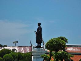 BANGKOK THAILAND08 APRIL 2019Monument of King Rama II that was built in front of Wat Arun photo