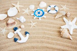 sea shells with sand as background photo