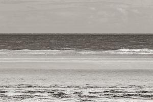 Natural Holbox island beach sandbank panorama turquoise water waves Mexico. photo