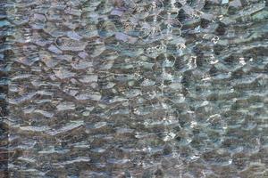 Cracked and abstract glass texture. Transparent material backdrop. Glass effect pattern. Mirror and glass background. photo