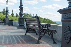 bench on the observation deck against the sky photo