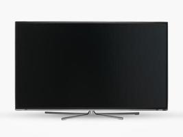 Primer plano de un moderno televisor LCD panorámico con pantalla plana y patas de metal sobre fondo blanco. foto