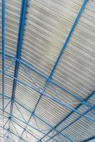 metal roof construction of an industrial facility, inside view photo