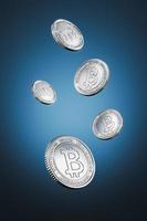 Silver Bitcoin coins float on blue background, For crypto currency market, token exchange promoting, advertising purpose. 3d rendering photo