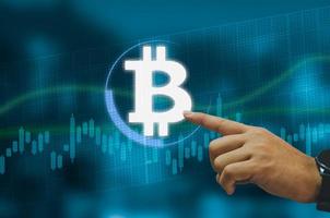 Hands touch bitcoin blockchain cryptocurrency for exchange in the future.Digital money exchange Technology global network connections background concept. photo