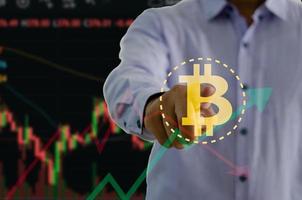 Hands touch bitcoin blockchain cryptocurrency for exchange in the future.Digital money exchange Technology global network connections background concept. photo
