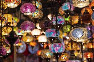 Oriental colorful glass hanging lamps or lanterns artistic selective focus background. photo