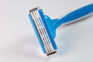 Blue and white modern razor - detail in macro photo