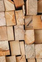 Wooden boards stacked on a pile as a background texture photo