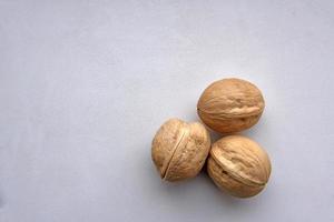 Walnuts in a shell on a white background photo