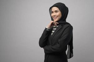 Beautiful business woman with hijab portrait on white background photo