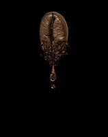 close up of coffee bean splashing photo