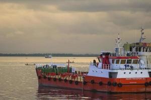 Sorong, West papua, Indonesia, September 30th 2021. Landing craft tank LCT mooring at the sea photo