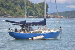 A blue fancy yacht at the sea photo