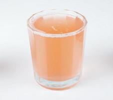 vaso de jugo de naranja foto