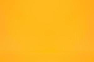 Smooth simple yellow abstract gradient background photo