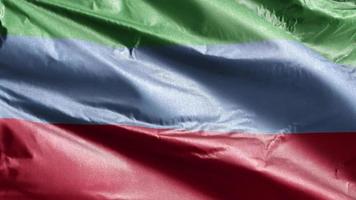 dagestan textilflagga långsamt viftande på vindslingan. dagestan banner smidigt vajande på vinden. tyg textilvävnad. full fyllning bakgrund. 20 sekunders loop. video